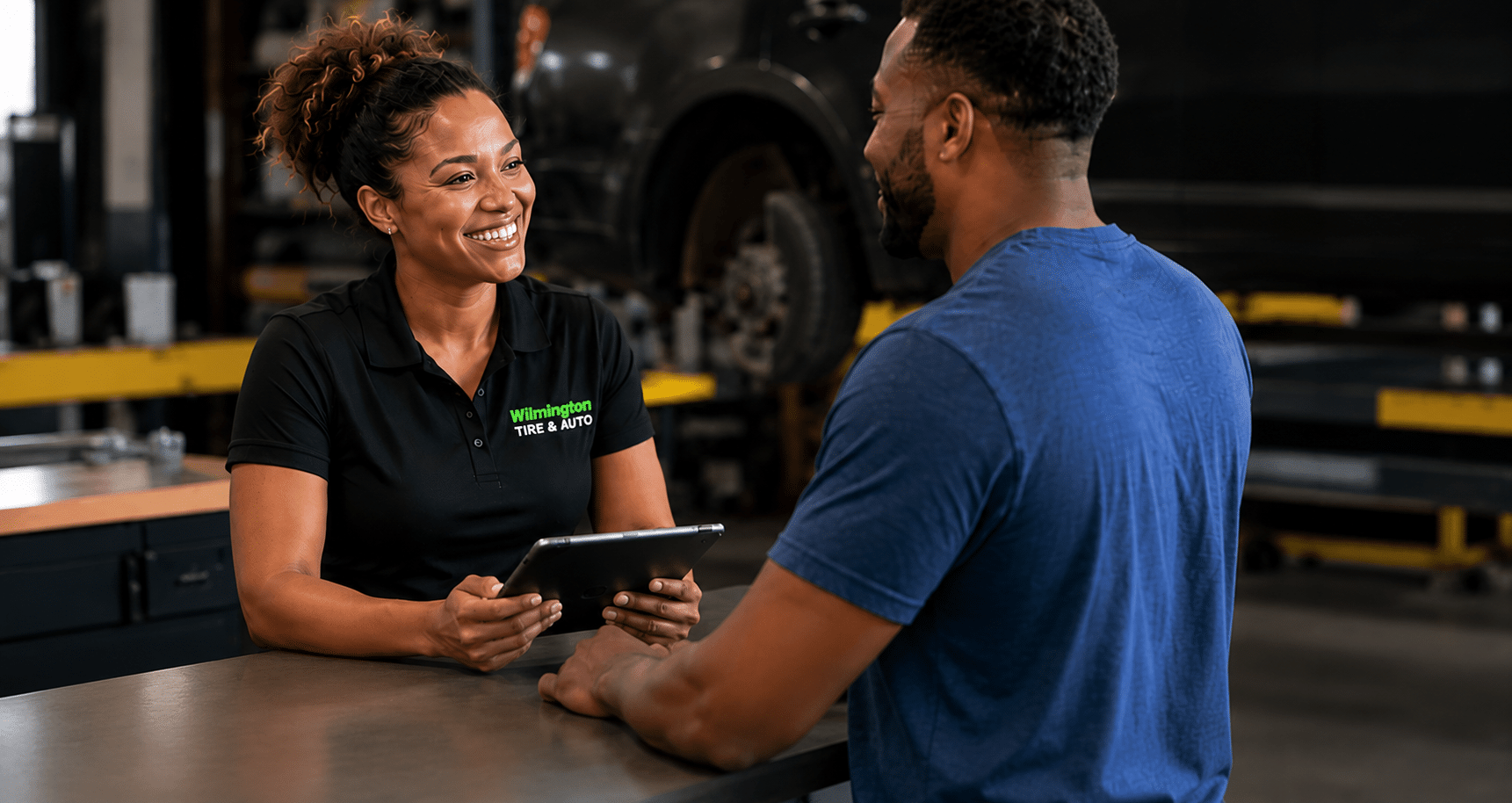 Service advisor discussing vehicle service with a customer